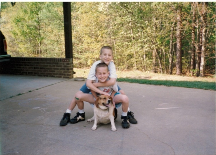 Brothers Cody, age 7 (top), and Brodie, age 9 (middle), with Gypsy, May 1995.