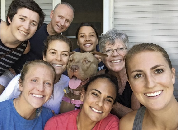 Brooklyn, surrounded by old friends and new family: front (left to right), Nikki Stanton, Taylor Lytle, Sarah Killion; middle, Maggie Pakutka, Kelley O’Hara, Sally Pakutka; back, Will Pakutka, Sam Kerr.